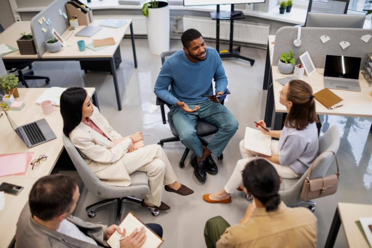 Financial analyst reviewing complex spreadsheet models on dual monitors